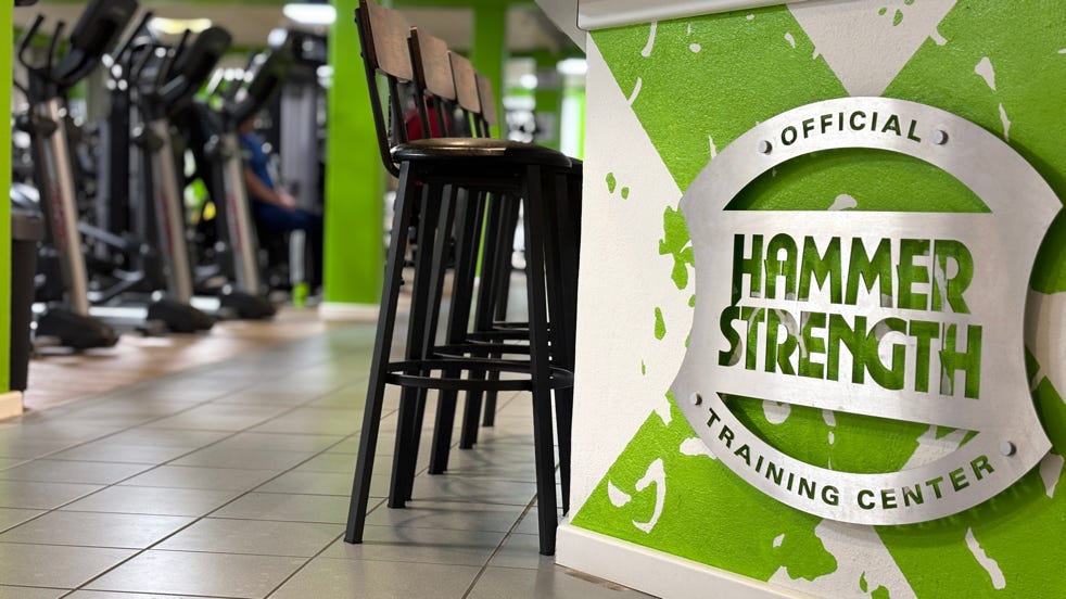 Person, Die Schwarze Langhantel Trägt